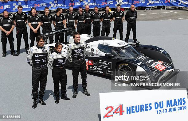 French Pierre Ragues, Belgian Vanina Ickx and French Franck Mailleux pose next to their Lola B09/60 Aston Martin N° 009 on June 7, 2010 in Le Mans,...