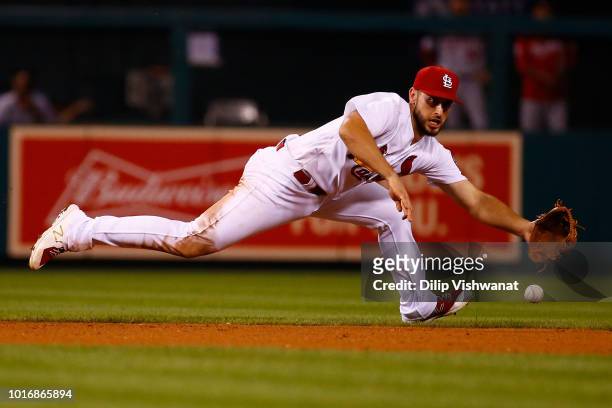 Paul DeJong of the St. Louis Cardinals fields a ground ball against the Washington Nationals ninth inning at Busch Stadium on August 14, 2018 in St....