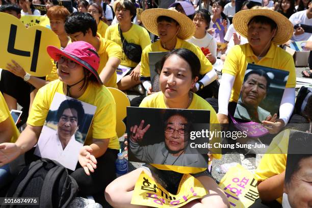 South Koreans attend the rally to mark the 73rd National Liberation Day in front of Japanese embassy on August 15, 2018 in Seoul, South Korea. South...