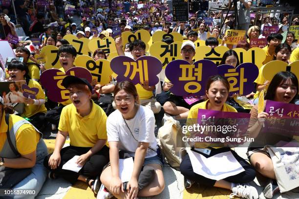 South Koreans attend the rally to mark the 73rd National Liberation Day in front of Japanese embassy on August 15, 2018 in Seoul, South Korea. South...