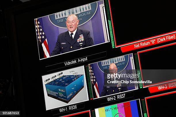 Coast Guard Admiral Thad Allen appears on a television monitor while briefing reporters at the White House on June 7, 2010 in Washington, DC....