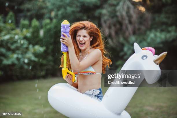 summer fun - inflatable unicorn stock pictures, royalty-free photos & images