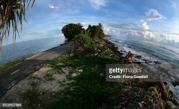 Narrow causeway at the north end of the island with the lagoon and ocean on August 15, 2018 in Funafuti, Tuvalu. The small South Pacific island...