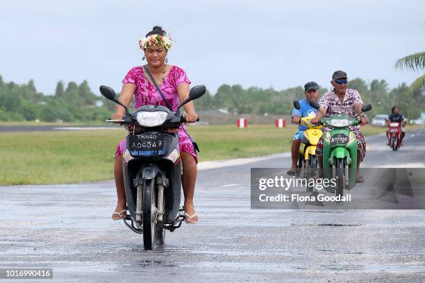 Motorbikes are the main mode of transport on the mainland on August 15, 2018 in Funafuti, Tuvalu. The small South Pacific island nation of Tuvalu is...