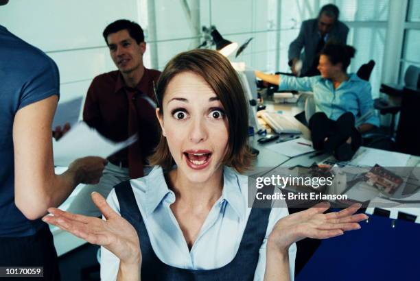 woman at desk, hands up, mouth open - incidental people stock pictures, royalty-free photos & images