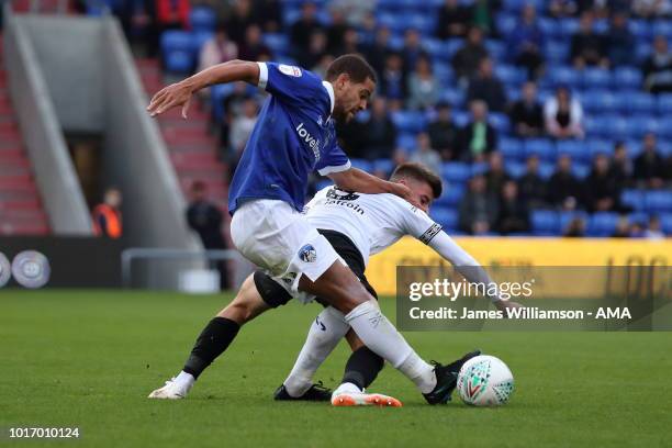 Giles Coke of Oldham Athletic and Mason Mount of Derby County during the Carabao Cup First Round match between Oldham Athletic and Derby County at...