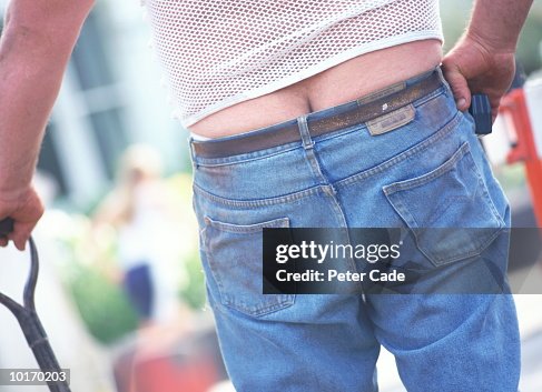 CONSTRUCTION WORKER WITH PANTS FALLING DOWN CONSTRUCTION WORKER WITH PANTS FALLING DOWN