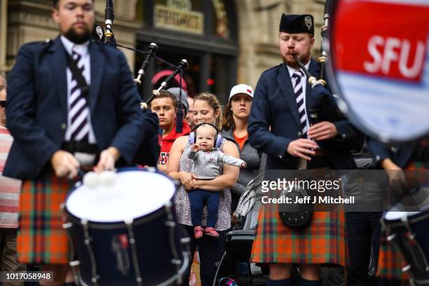 The Simon Fraser University play in Buchanan street during the Piping Live! Glasgow International Piping Festival on August 15, 2018 in Glasgow,...