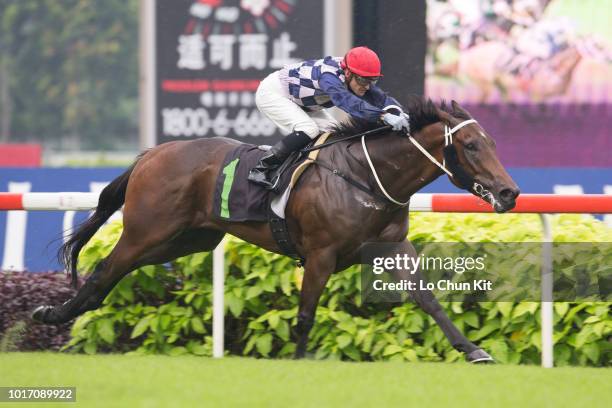 Jockey Corey Brown riding Assertive Lad wins Race 2 Singapore Airlines A380 Shanghai Stakes Restricted Maiden at Kranji Racecourse on May 18 ,2014 in...