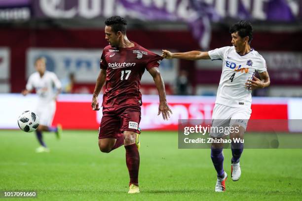 Wellington and Mizumoto Hiroki in action during the J.League J1 match between Vissel Kobe and Sanfrecce Hiroshima at Noevir Stadium Kobe on August...