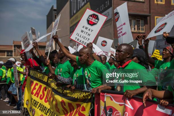 The Food and Allied Workers Union and civil organizations march from Church Square to the National Treasury demanding help in fighting illicit crime...