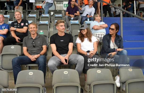 Juergen Klinsmann and Jonathan Klinsmann of Hertha BSC, Laila Klinsmann and Debbie Chin Klinsmann before the game between Hertha BSC and Hallescher...