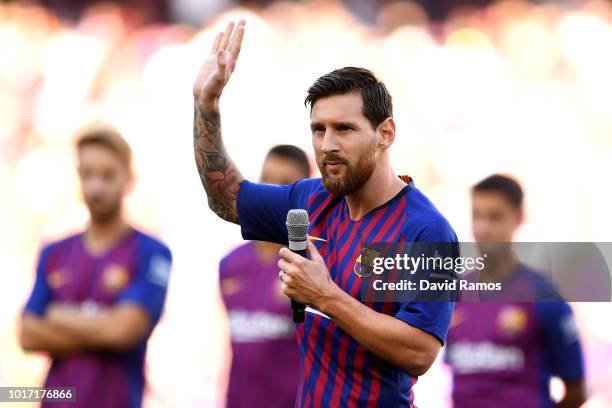 Lionel Messi of Barcelona addresses the fans ahead of the Joan Gamper Trophy between FC Barcelona and Boca Juniors at Camp Nou on August 15, 2018 in...