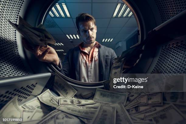 witwassen van geld - money laundery stockfoto's en -beelden