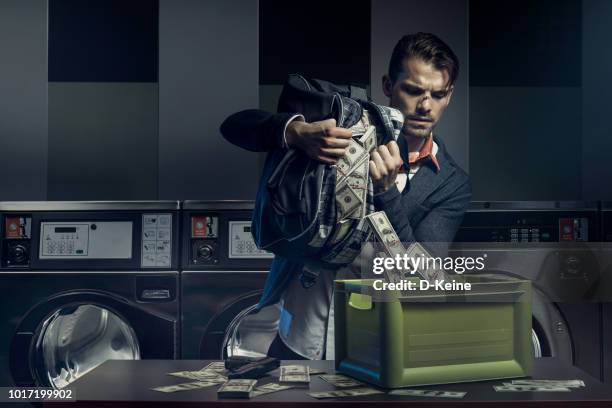 blanqueo de dinero - blanqueo de dinero fotografías e imágenes de stock