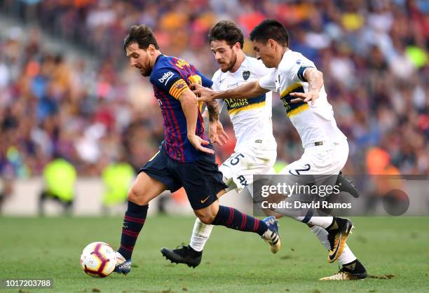 Lionel Messi of Barcelona , Nahitan Nandez and Paulo Goltz of Boca Juniors in action during the Joan Gamper Trophy between FC Barcelona and Boca...