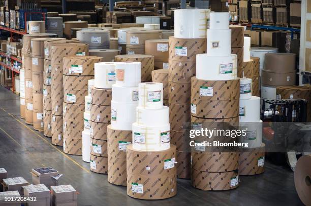 Rolls of raw paper sit in stacks at the Great Little Box Co. Manufacturing facility in Vancouver, British Columbia, Canada, on Friday, Aug. 10, 2018....