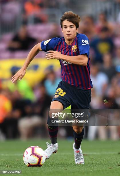 Riqui Puig of FC Barcelona runs with the ball during the Joan Gamper Trophy match between FC Barcelona and Boca Juniors at Camp Nou on August 15,...