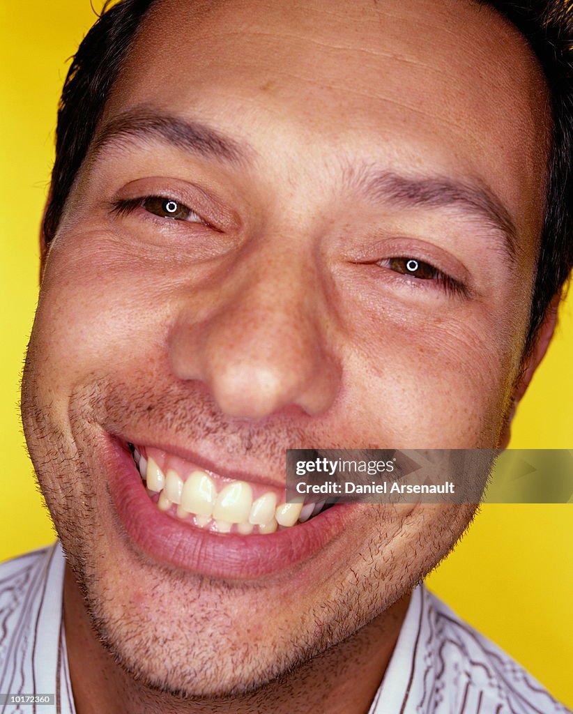 MAN SMILING SHOWING TEETH, PORTRAIT