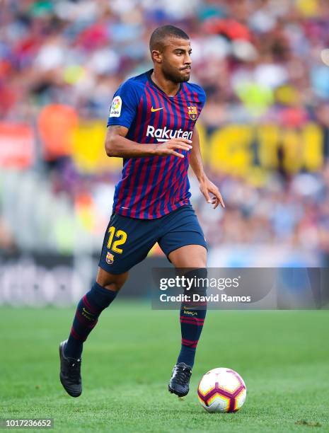 Rafinha Alcantara of FC Barcelona runs with the ball during the Joan Gamper Trophy match between FC Barcelona and Boca Juniors at Camp Nou on August...