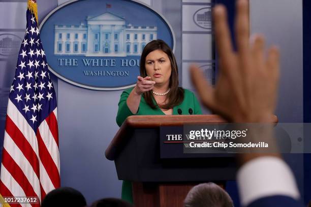 White House Press Secretary Sarah Huckabee Sanders calls on reporters during a news conference in the Brady Press Briefing Room at the White House...