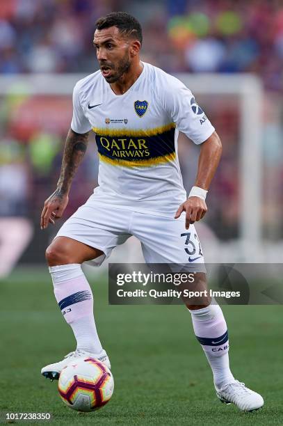 Carlos Tevez of Boca Juniors controls the ball during the Joan Gamper Trophy match between FC Barcelona and Boca Juniors at Camp Nou on August 15,...