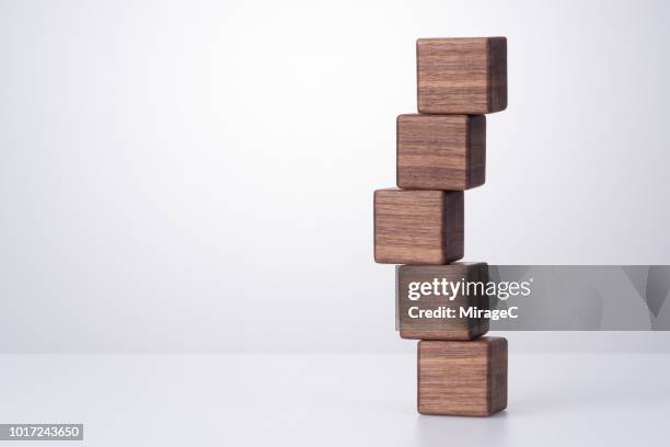 wood block stacking - wood block stacking stock pictures, royalty-free photos & images