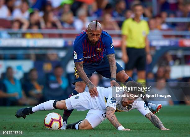 Arturo Vidal of Barcelona competes for the ball with Nahitan Nandez of Boca Juniors during the Joan Gamper Trophy match between FC Barcelona and Boca...