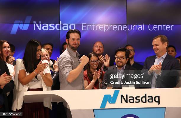 Reddit co-founder Alexis Ohanian pumps his fist as he rings the Nasdaq closing bell from the Nasdaq Entrepreneurial Center on August 15, 2018 in San...