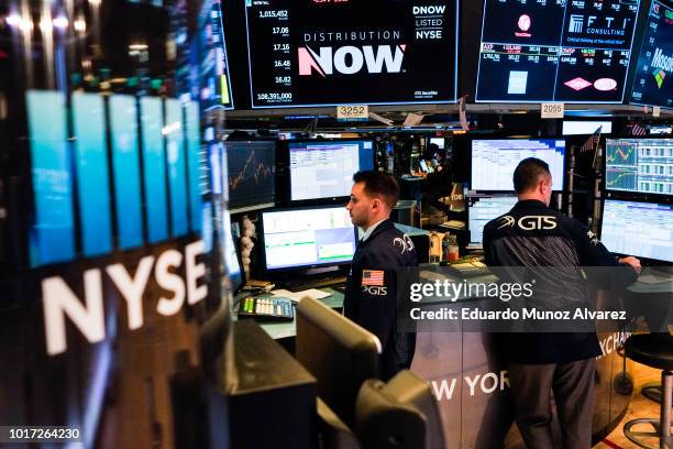 Traders work on the floor of the New York Stock Exchange ahead of the closing bell on August 15, 2018 in New York City. U.S. Stocks fight to avoid a...