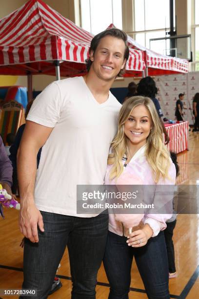 Andrew East and Shawn Johnson attend as Vera Bradley partners with Blessings In A Backpack to kick-off back-to-school philanthropy tour at St....