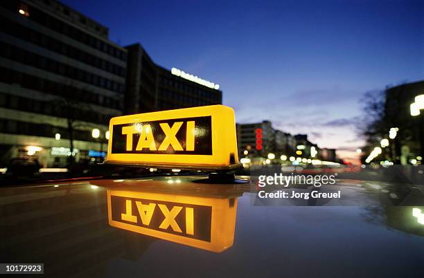 taxi sign, berlin, germany - taxi stock pictures, royalty-free photos & images