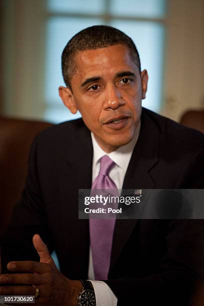 President Barack Obama meets with cabinet members to discuss the administration's response to the BP Deepwater Horizon oil spill, in the Cabinet Room...