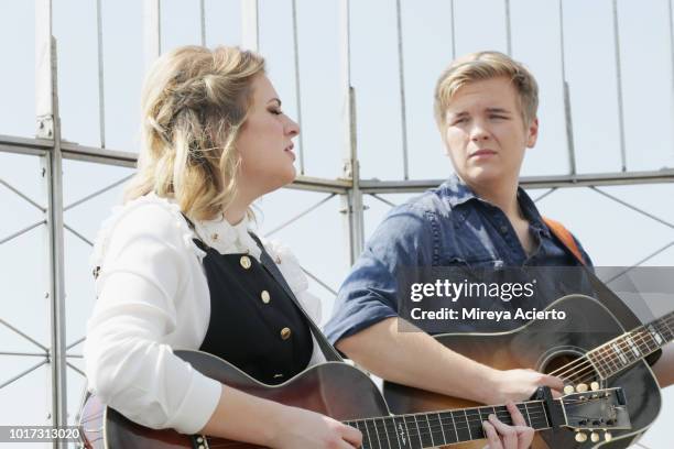 American Idol" winner, Maddie Poppe and "American Idol" runner-up, Caleb Lee Hutchinson visit The Empire State Building on August 15, 2018 in New...