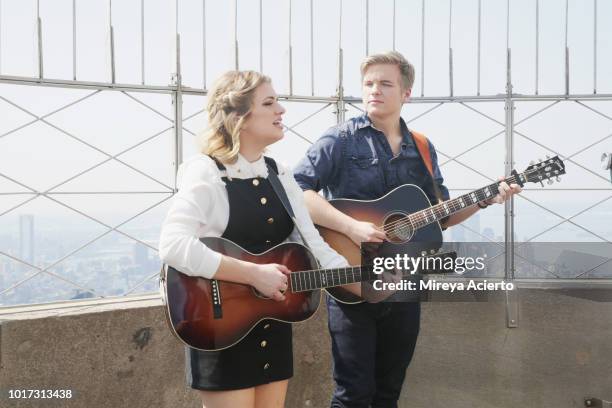 American Idol" winner, Maddie Poppe and "American Idol" runner-up, Caleb Lee Hutchinson perform at The Empire State Building on August 15, 2018 in...