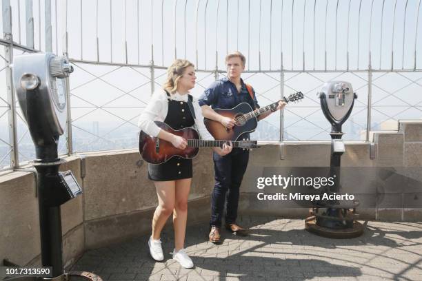 American Idol" winner, Maddie Poppe and "American Idol" runner-up, Caleb Lee Hutchinson perform at The Empire State Building on August 15, 2018 in...