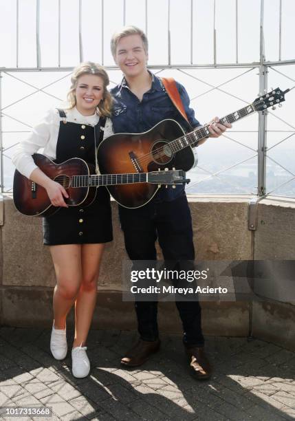 American Idol" winner, Maddie Poppe and "American Idol" runner-up, Caleb Lee Hutchinson visit The Empire State Building on August 15, 2018 in New...