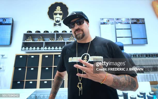 Music artist and longtime cannabis afficinado B Real of Cypress Hill stikes a pose at the opening of his flagship medical and recreational marijuana...