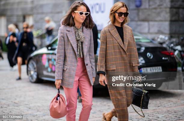 Guests seen outside Line of Oslo during Oslo Runway SS19 on August 15, 2018 in Oslo, Norway.