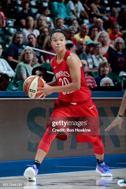 Kristi Toliver of the Washington Mystics handles the ball during the game against the Indiana Fever on August 15, 2018 at Bankers Life Fieldhouse in...