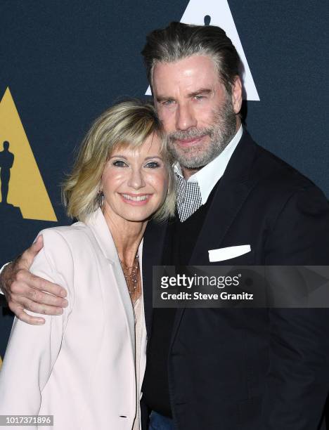 Olivia Newton-John and John Travolta attend the "Grease" 40th anniversary screening at Samuel Goldwyn Theater on August 15, 2018 in Beverly Hills,...