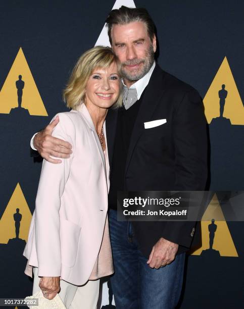 Olivia Newton-John and John Travolta attend the "Grease" 40th anniversary screening at Samuel Goldwyn Theater on August 15, 2018 in Beverly Hills,...