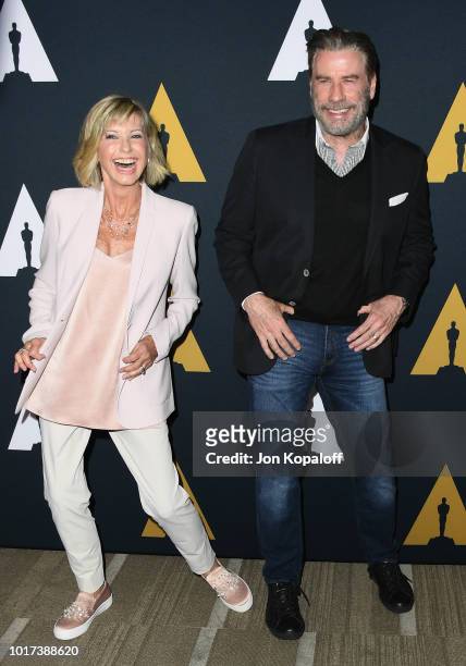 Olivia Newton-John and John Travolta attend The Academy Presents "Grease" 40th Anniversary at Samuel Goldwyn Theater on August 15, 2018 in Beverly...