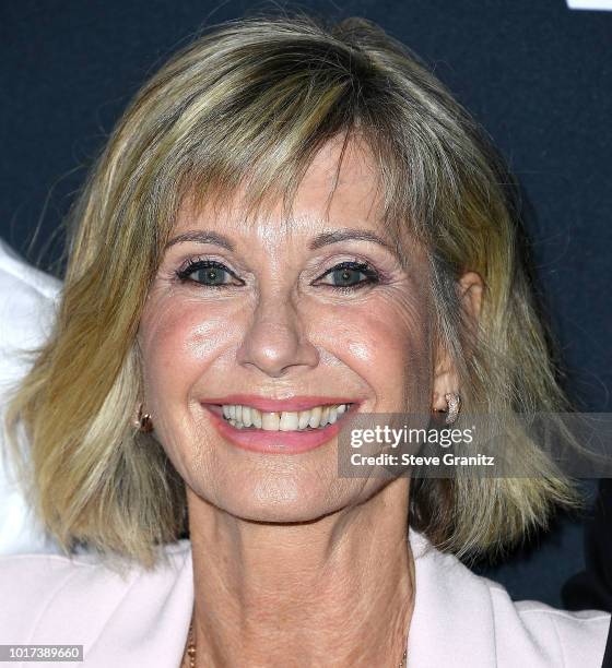 Olivia Newton John arrives at the The Academy Presents "Grease" 40th Anniversary at Samuel Goldwyn Theater on August 15, 2018 in Beverly Hills,...