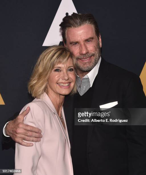Olivia Newton-John and John Travolta attend the Academy Presents "Grease" 40th Anniversary at the Samuel Goldwyn Theater on August 15, 2018 in...