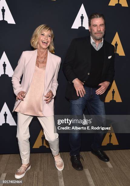 Olivia Newton-John and John Travolta attend the Academy Presents "Grease" 40th Anniversary at the Samuel Goldwyn Theater on August 15, 2018 in...