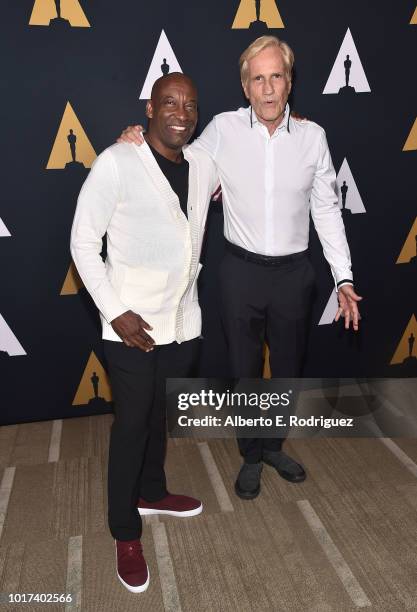 John Singleton and Randal Kleiser attend the Academy Presents "Grease" 40th Anniversary at the Samuel Goldwyn Theater on August 15, 2018 in Beverly...