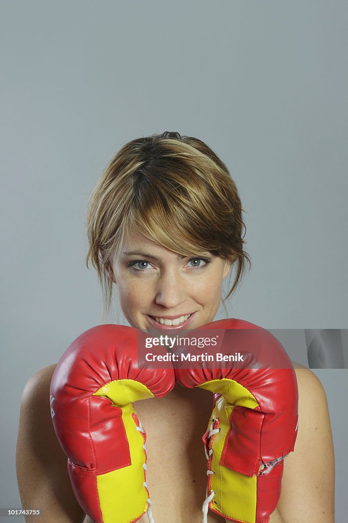 Woman with boxing gloves, portait, elevated view