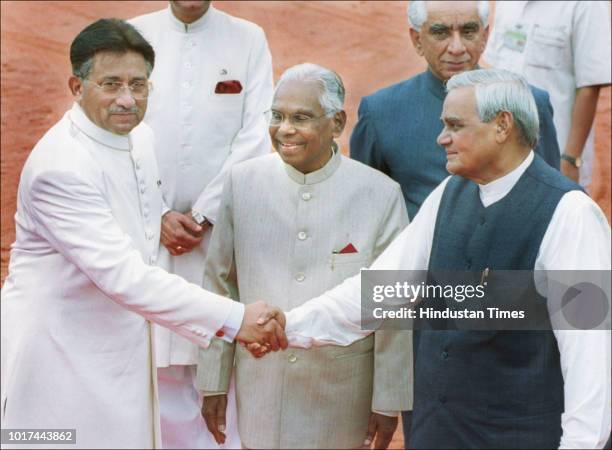 Pakistani President Pervez Musharraf bids farewell to Indian Prime Minister Atal Bihari Vajpayee as President K.R. Narayanan looks on, after an...