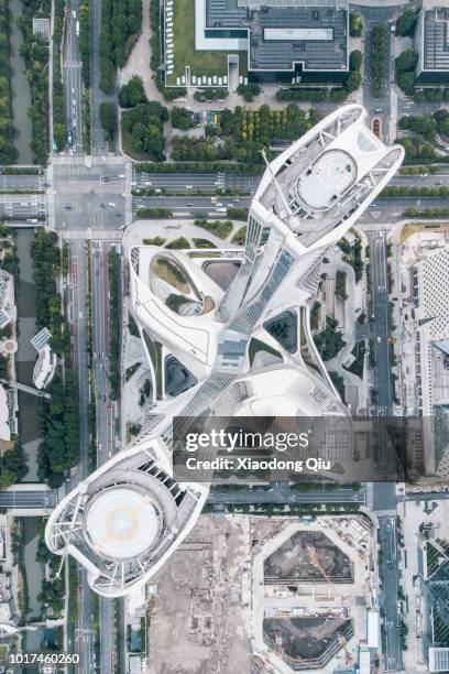 aerial view of hangzhou raffles city at dusk - singapore city aerial stock pictures, royalty-free photos & images